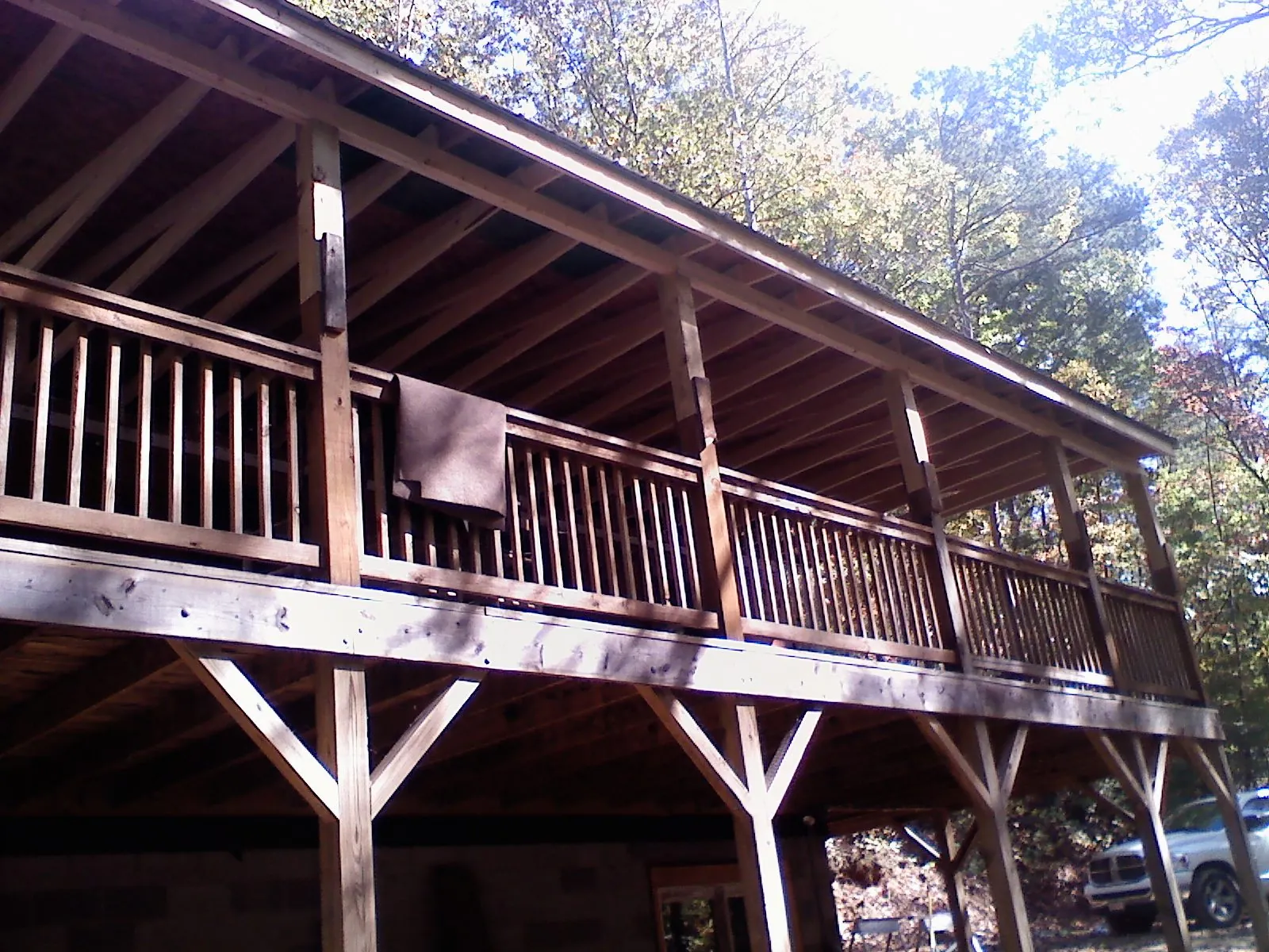 Timber framing under a new elevated porch and deck — Roof Leak Repair in Larimore by Roofing Brothers